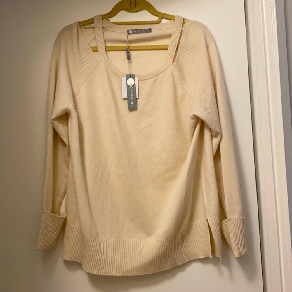 In cashmere cut out shoulder sweater. NWT